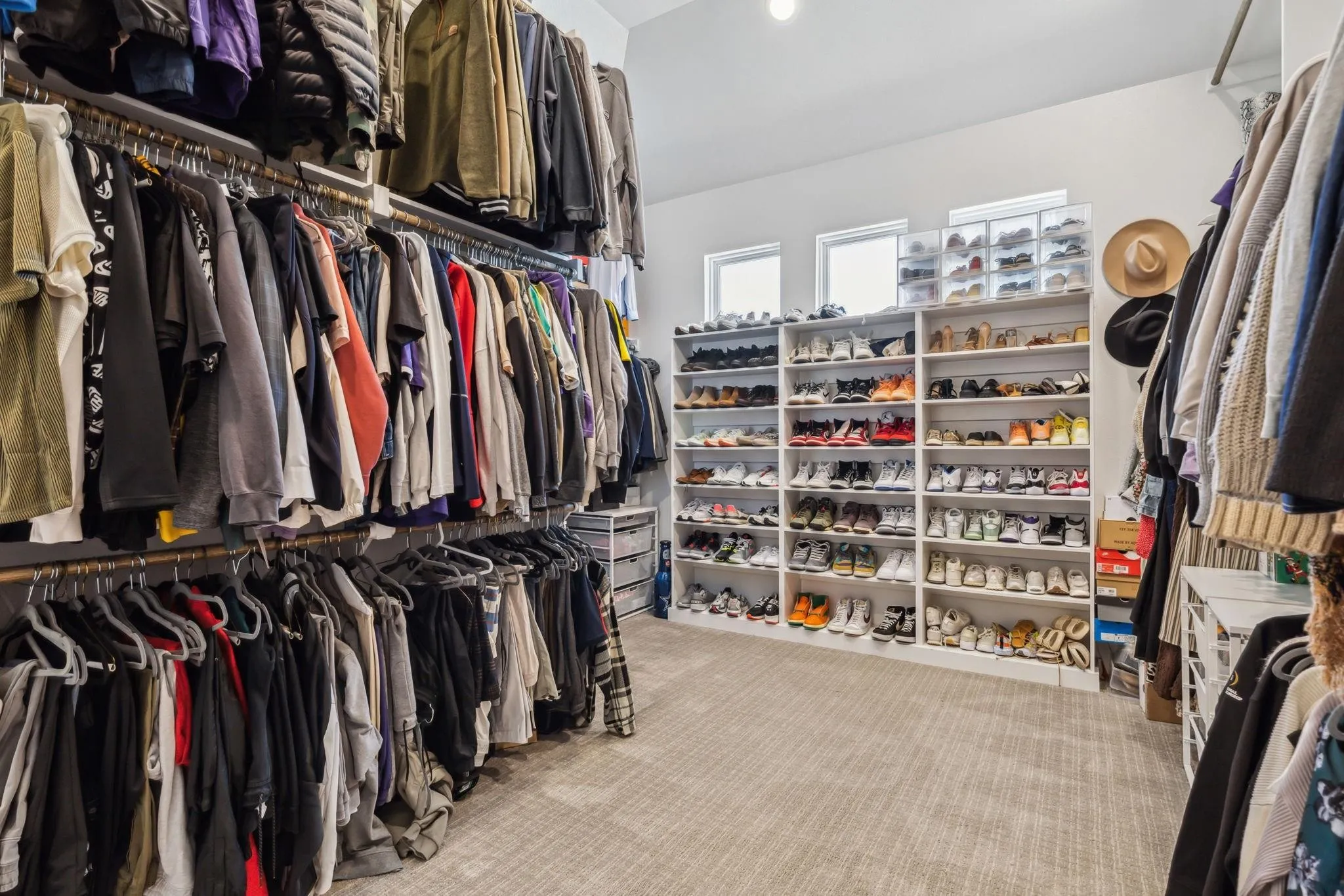 Simplified closet organization featuring clothing and shoe storage — personalized home organization services by ARC in Dallas-Fort Worth.