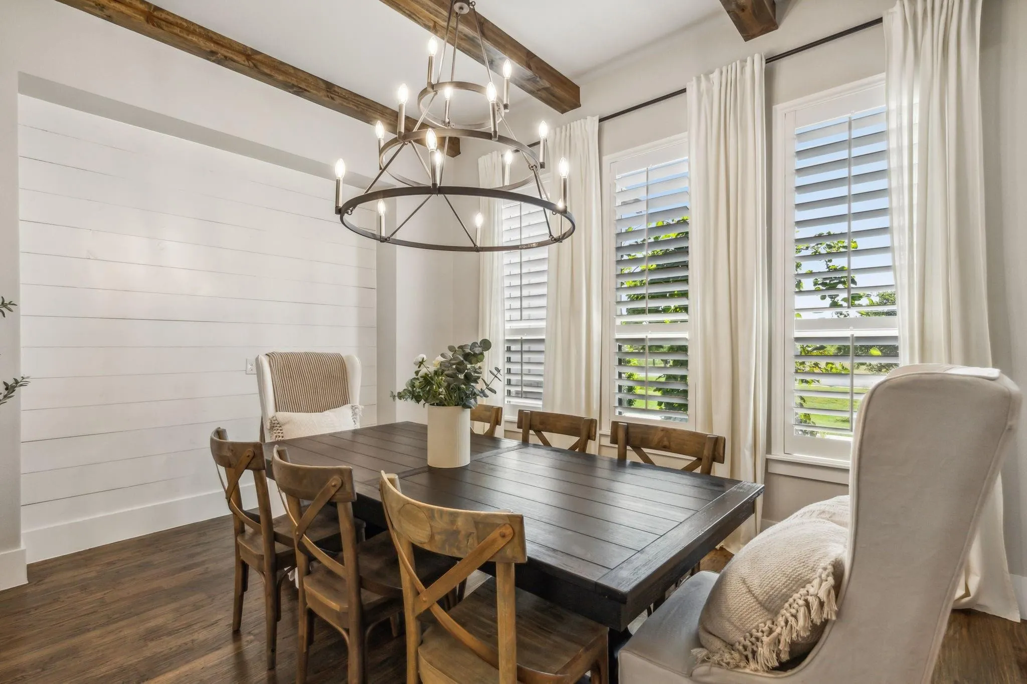 http://Modern%20dining%20room%20in%20Mike%20DePriest’s%20Northlake,%20TX%20home,%20featuring%20a%20sleek%20dining%20table,%20elegant%20lighting,%20and%20an%20open-concept%20design%20for%20stylish%20entertaining.